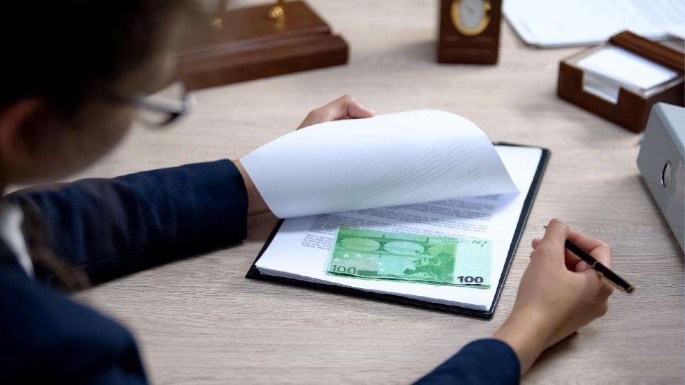 money hidden behind a page